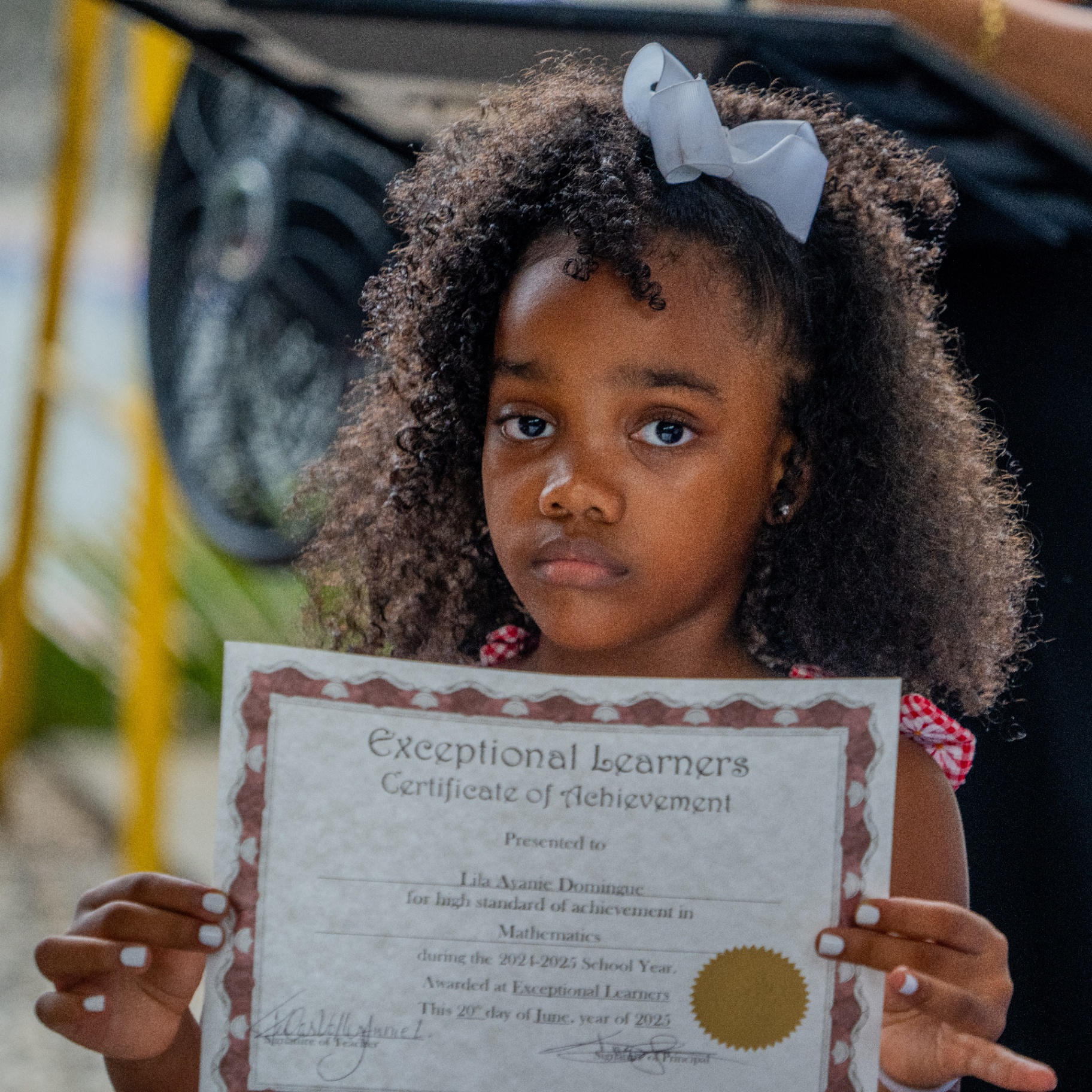 Student with certificate of achievement