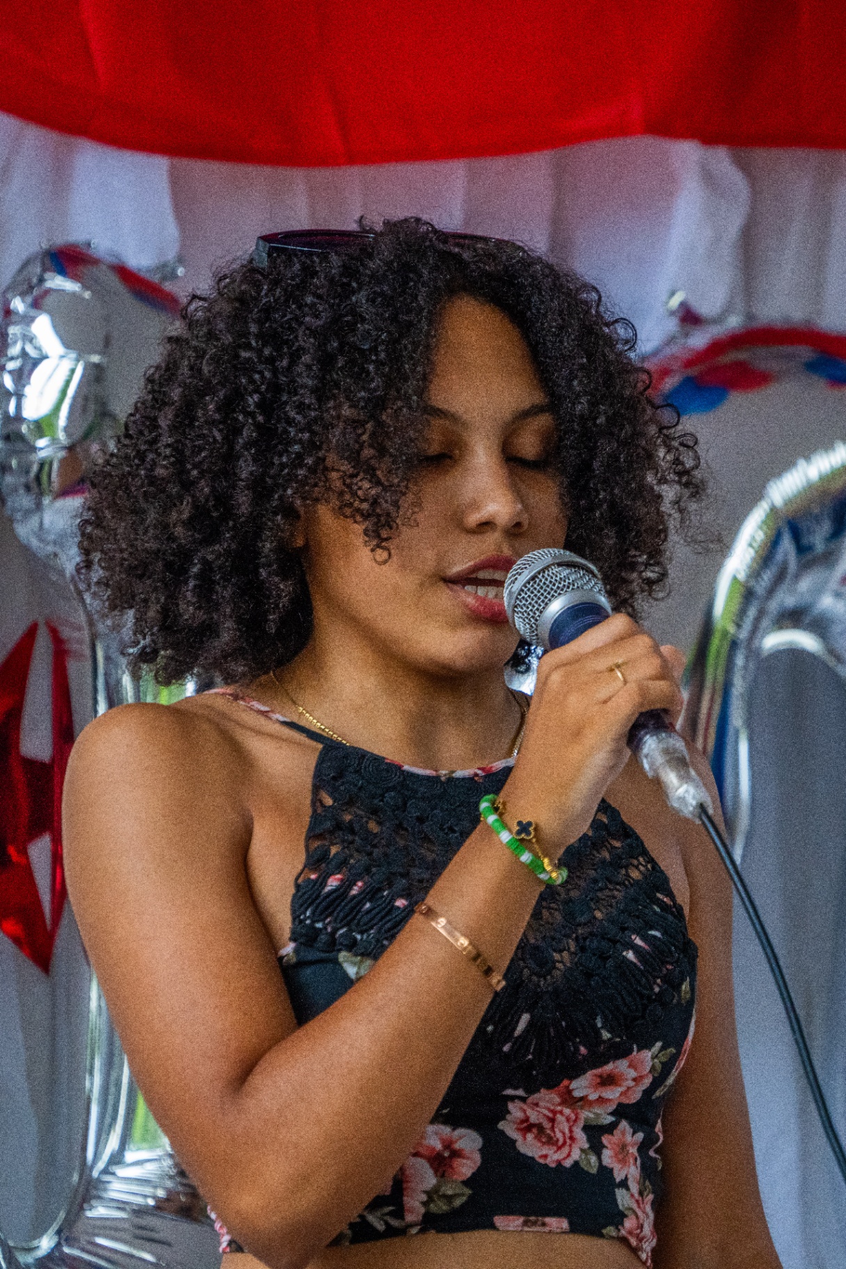 Student singing on stage